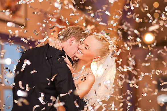 Bride and groom embrace on their wedding day