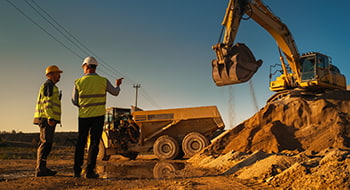 construction workers at a busy worksite